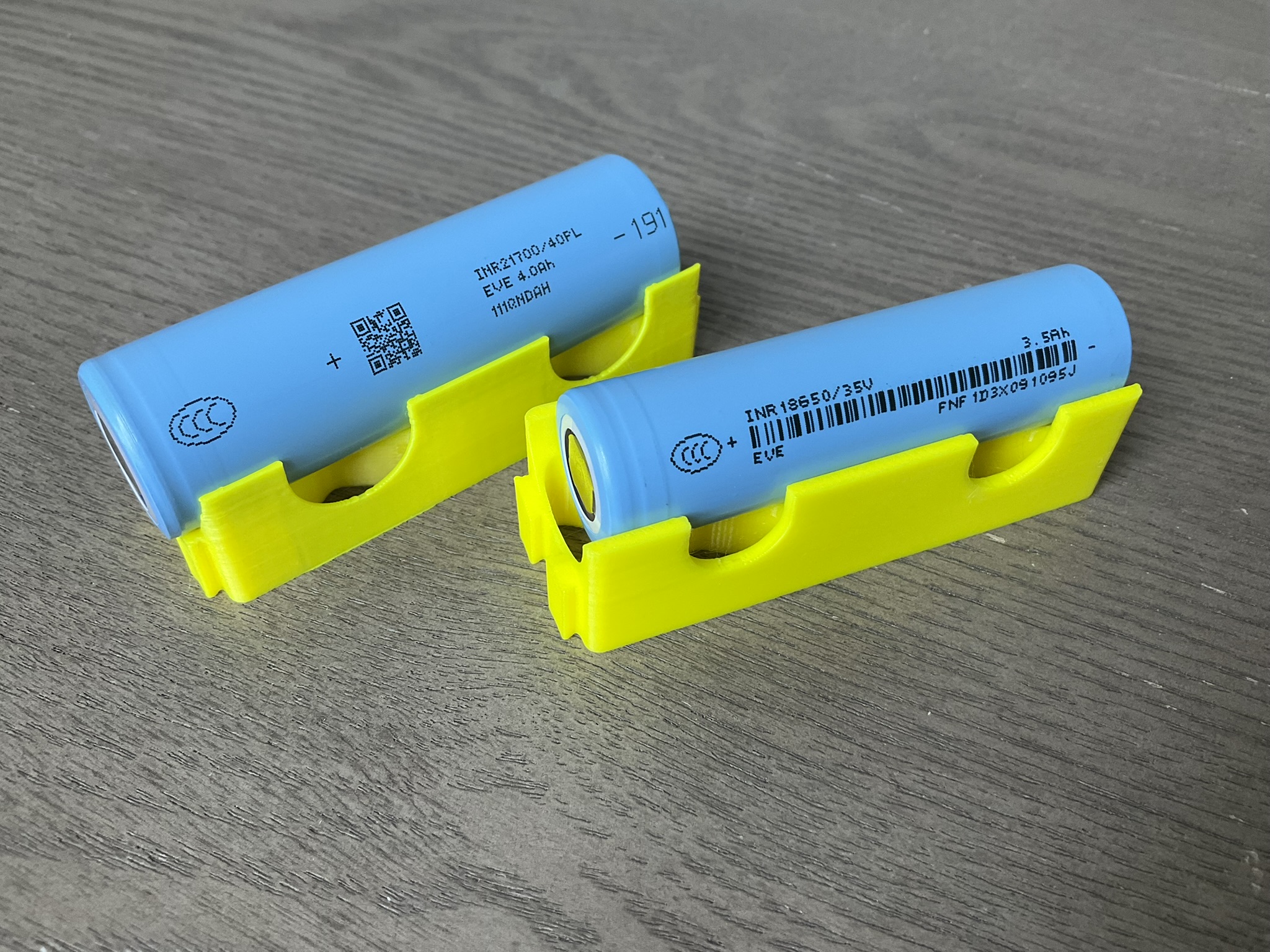 Figure 4 — A pair of 18650 lithium-ion cells (left), shown next to a larger 21700 (right) for scale. The PicoCalc uses two 18650 cells.