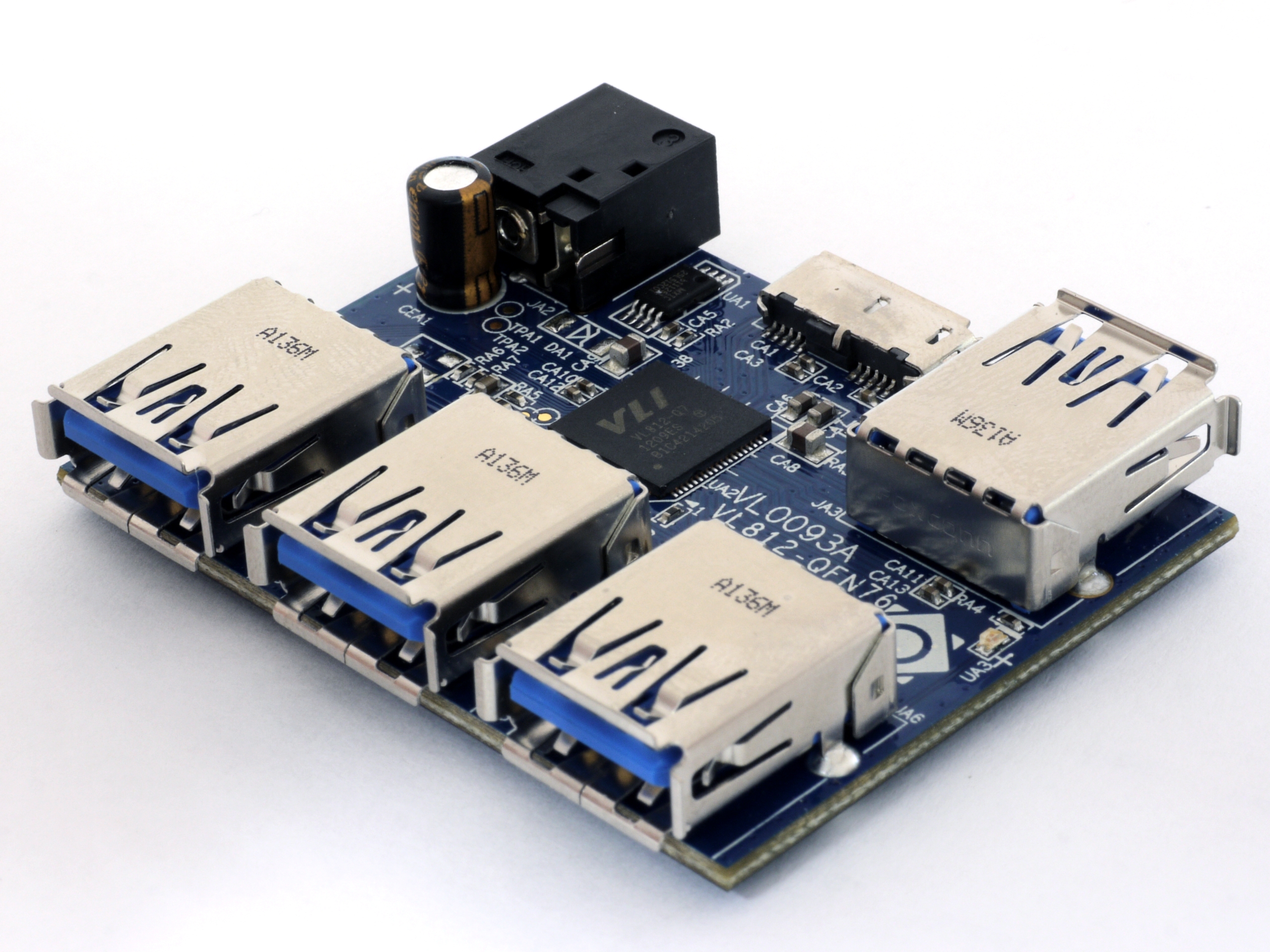 Figure 4 — A small USB hub PCB built around a single-chip controller (VIA Labs VL812 in this example — same architecture class as the GL850G recommended below: USB hub controller, a few passives, no external …