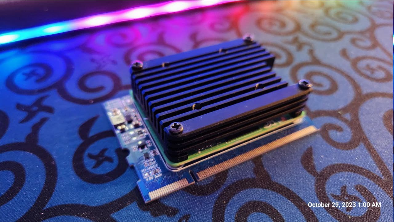 Figure 6 — 6 — The uConsole's back bay, where the mainboard, Adapter Board, NVMe Battery Board, and AIO V2 stack up under the rear panel. Photo via forum.clockworkpi.com (web search; personal-refere…